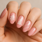Explore elegant pink Christmas nail designs with charming details and festive style.